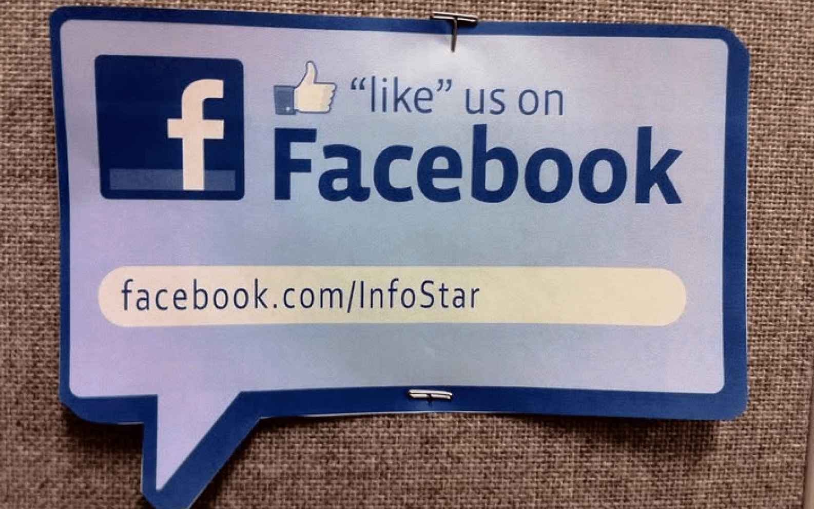 Illustration of a 2007-inspired Facebook page for a fictional dental practice, with dental team photos on a walnut surface.